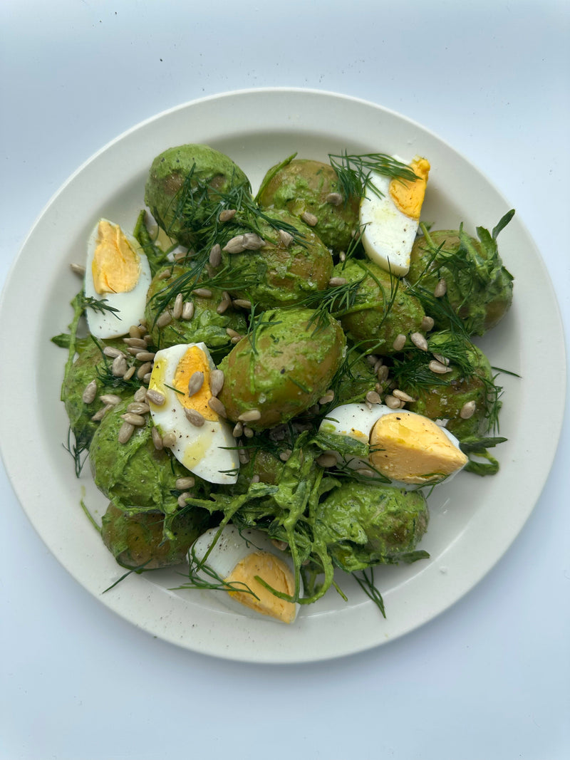 Potato and egg salad with creamy wild garlic dressing